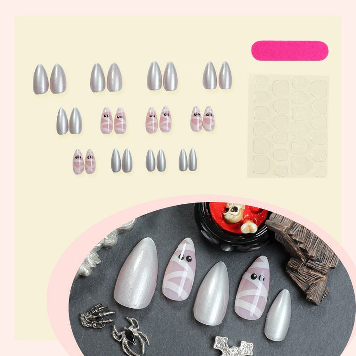 Kunstnagelset mit zarten Ballettmotiven und schimmernden Akzenten Karnz