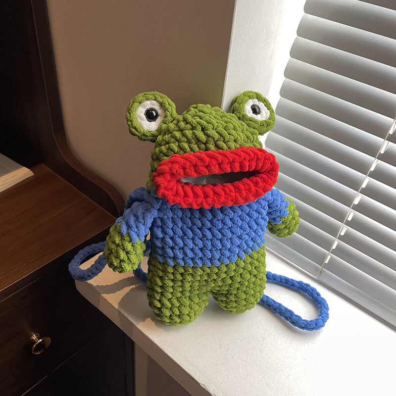 Süßer froschförmiger gehäkelter Mini-Rucksack