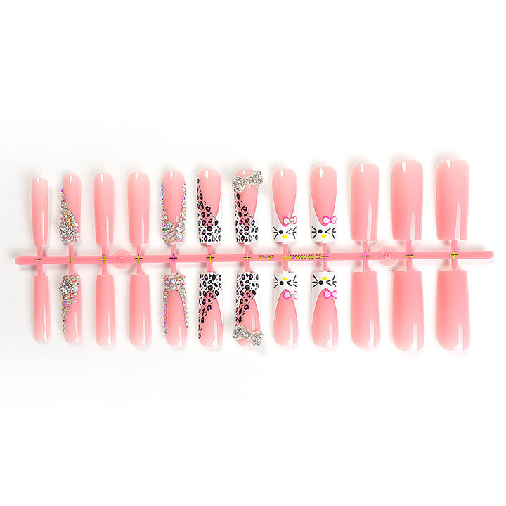 Glamouröses Kunstnagelset mit funkelnden Strassverzierungen und kreativen Tiermotiven Karnz