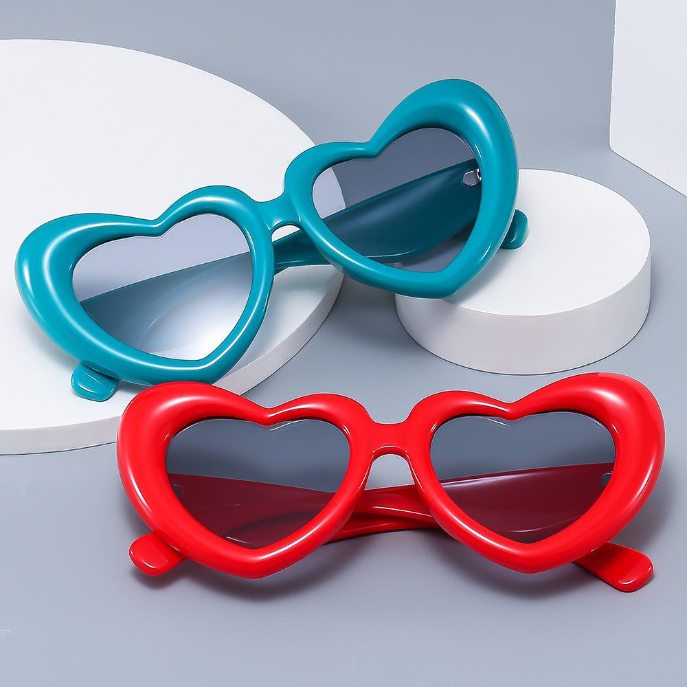 Damen Herzförmige Sonnenbrille mit stylischem Rahmen Karnz