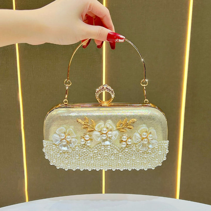 Elegante perlenverzierte Abendtasche