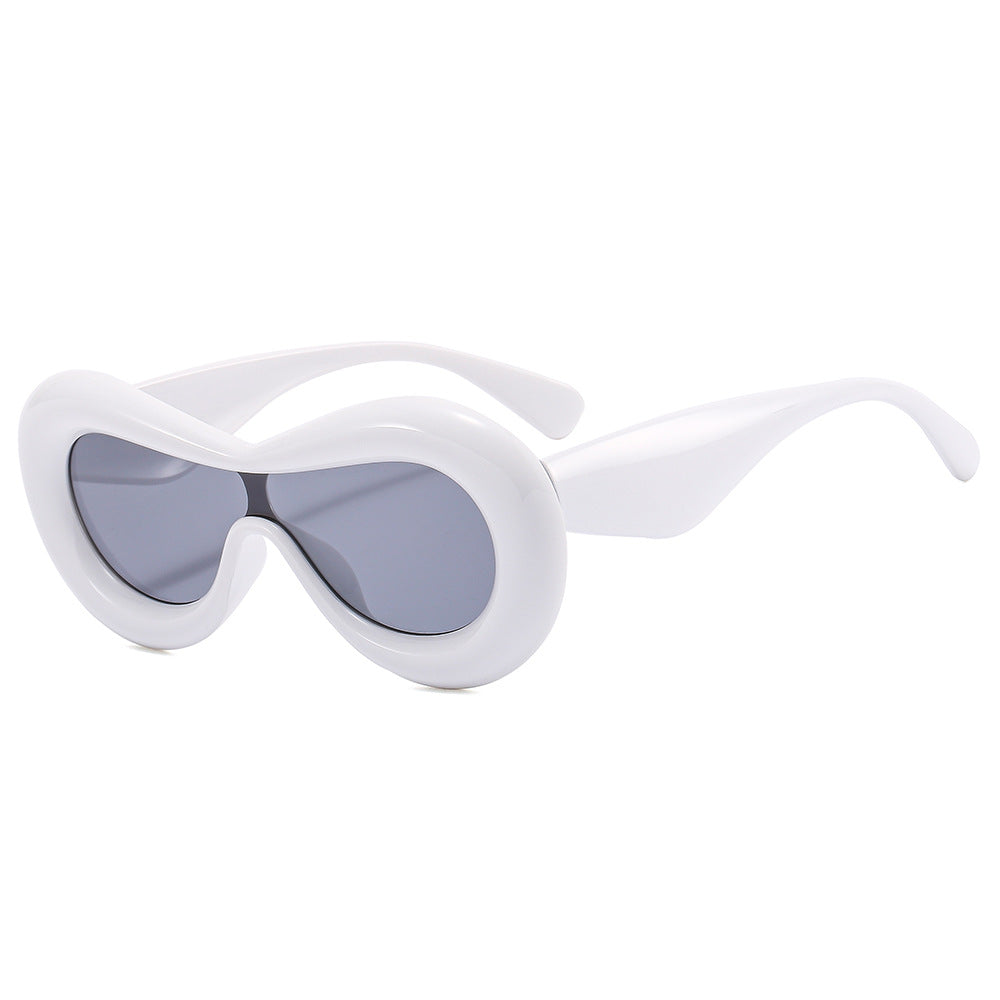 Damen modische Sonnenbrille mit nostalgischem Schwung Karnz