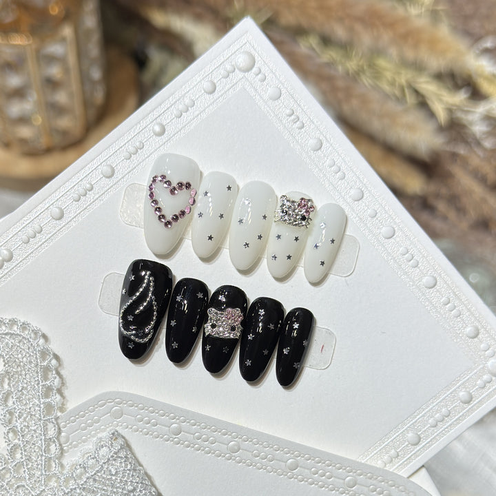 Elegante Sternenhimmel Kunst Press-On Nagelset Karnz