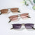Damen elegante geometrische Sonnenbrille mit stylischem Metallrahmen Karnz