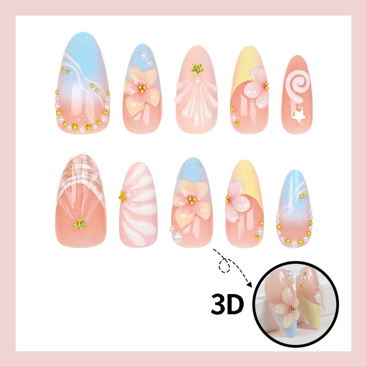 Kunstnagelset mit elegantem Blüten- und Muscheldesign Karnz