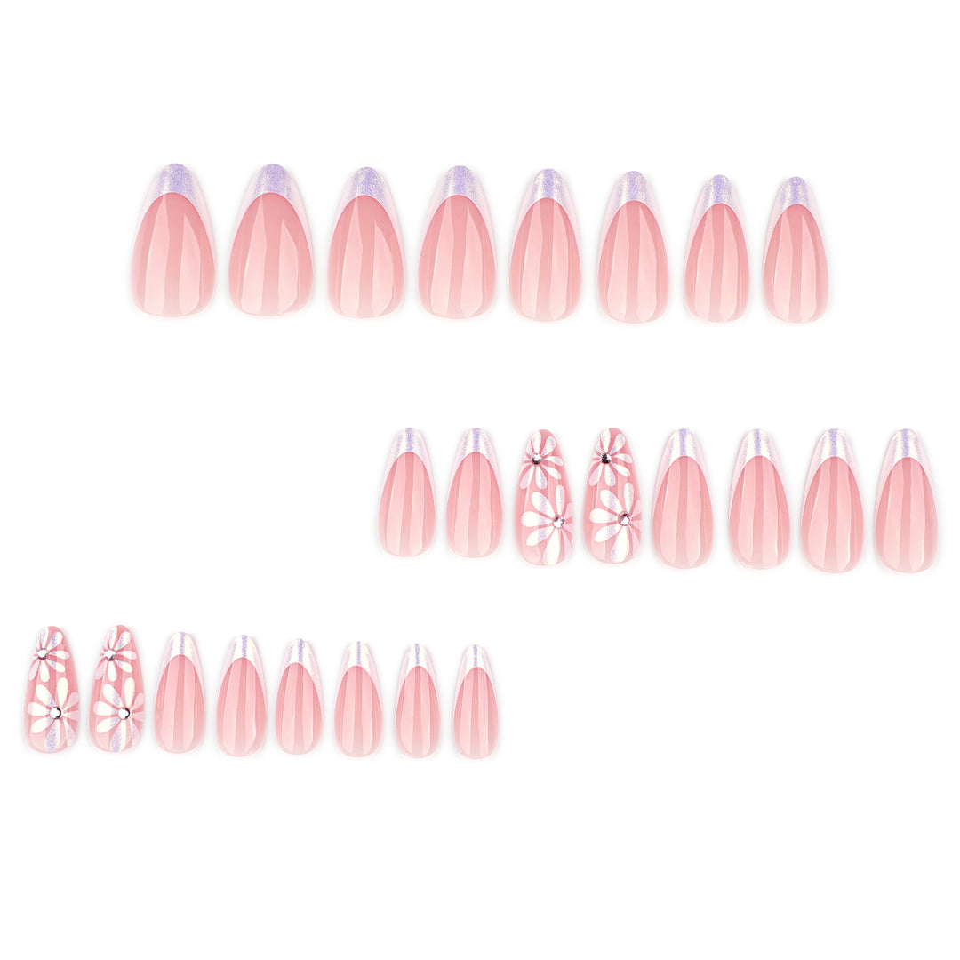 Elegante Kunstnägel mit floralem Design und Glitzerverzierungen Karnz