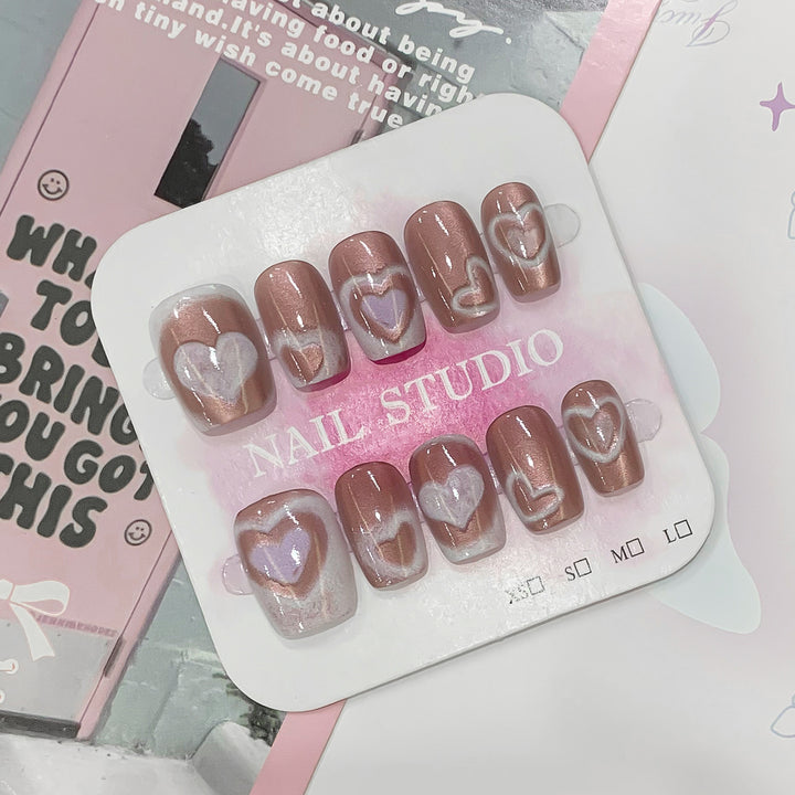 Künstliche Nagelspitzen im Herz-Design Karnz