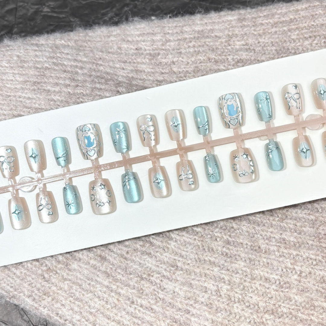Künstlerisches Press-On Nagelset mit elegantem Stern Design