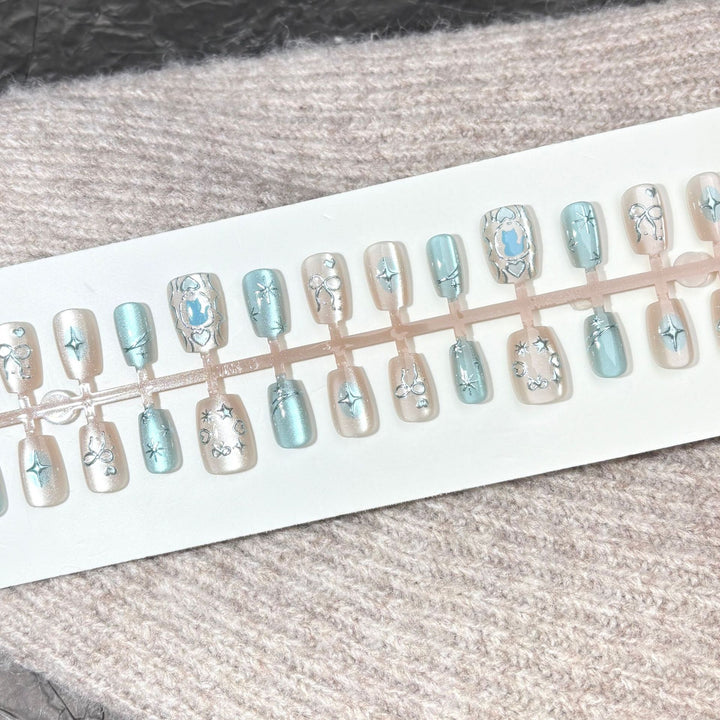 Künstlerisches Press-On Nagelset mit elegantem Stern Design