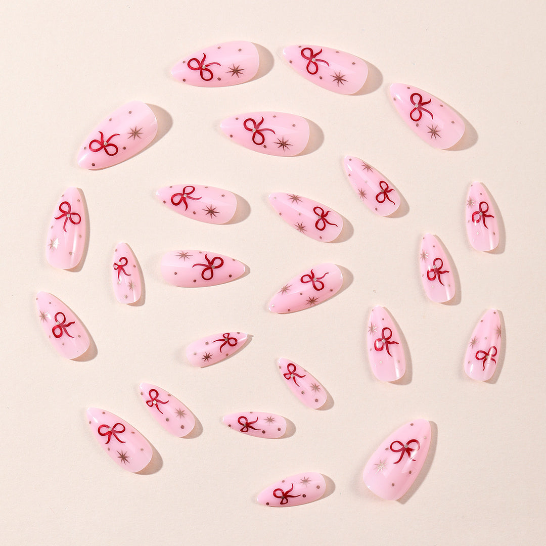 Stiletto-Nail-Art-Extensions mit Schleifenakzenten Karnz