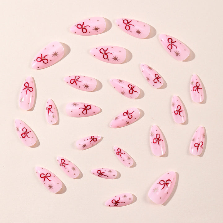 Stiletto-Nail-Art-Extensions mit Schleifenakzenten Karnz
