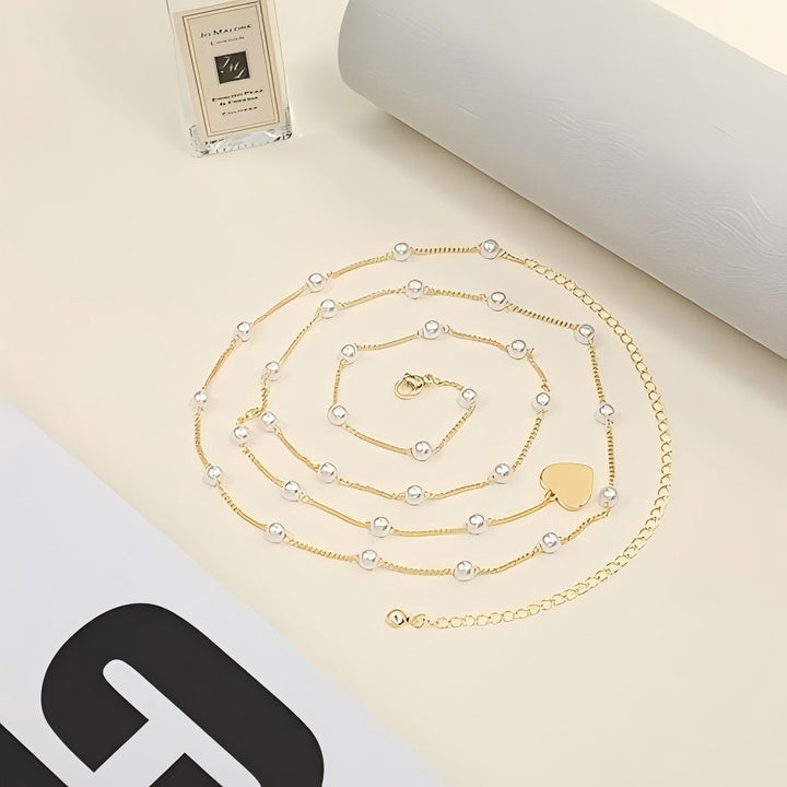 Elegante Perlen- und Herzanhänger-Bauchkette Karnz