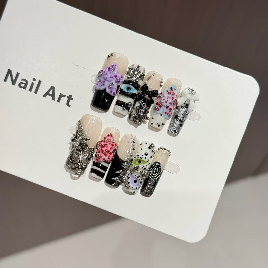 Künstlerisches Press-On-Nagelset mit einzigartigen Designelementen