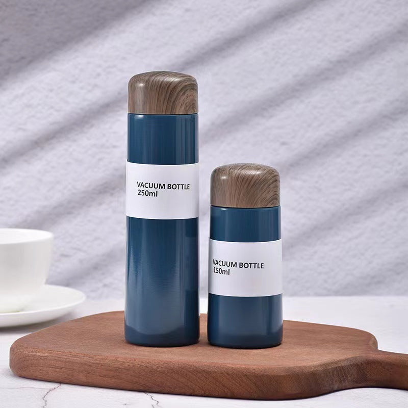Damen vakuumisolierte Wasserflasche mit innovativem Holzdeckel Karnz