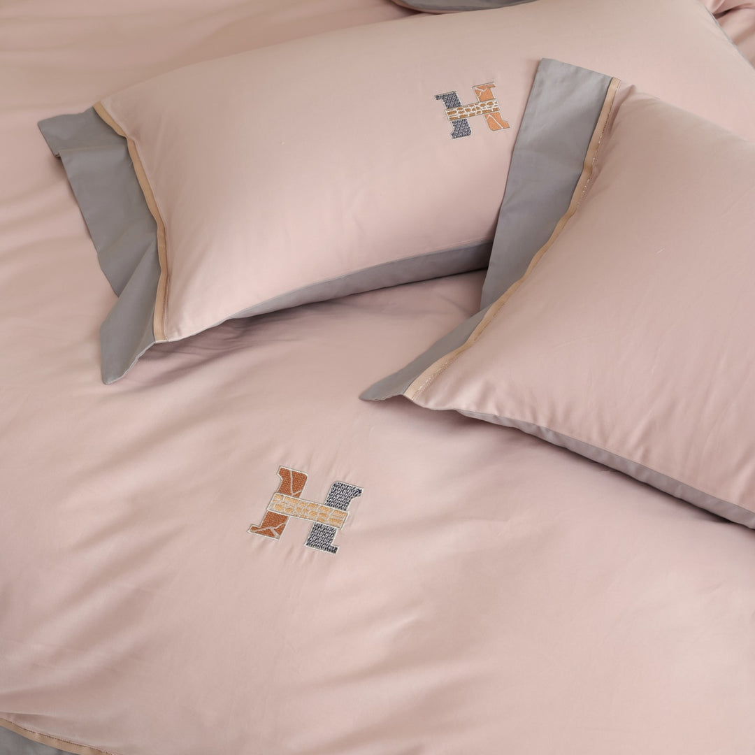 Zweifarbiges Luxus-Baumwoll-Percale-Bettwäsche-Set mit wendbarem Finish und besticktem Monogramm