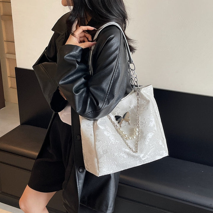 Elegante Handtasche mit Perlendetails Karnz