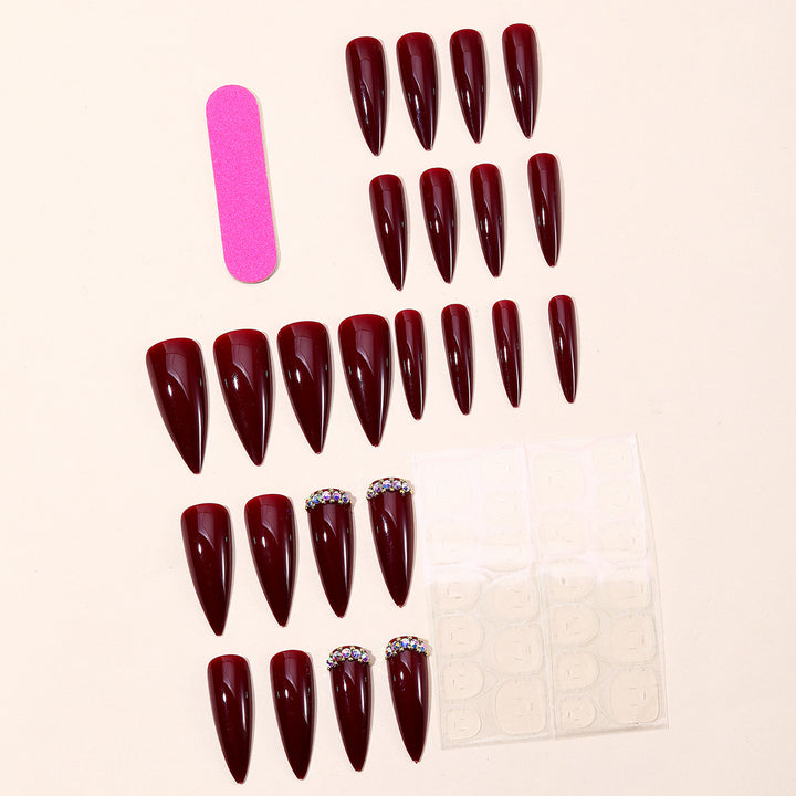 Elegante Stiletto-Nagelkunstverlängerungen mit Glitzerakzenten Karnz