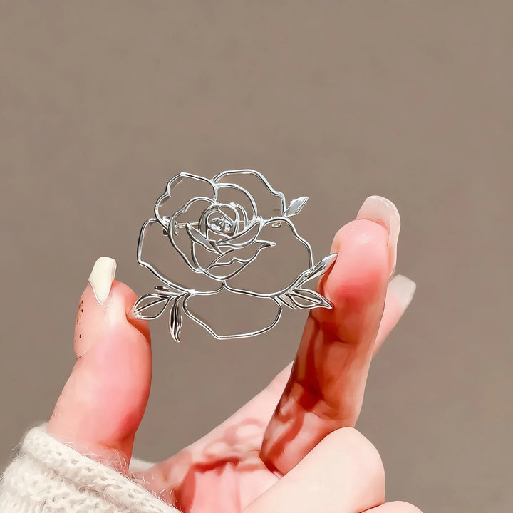 Elegante Rosé Brosche Karnz