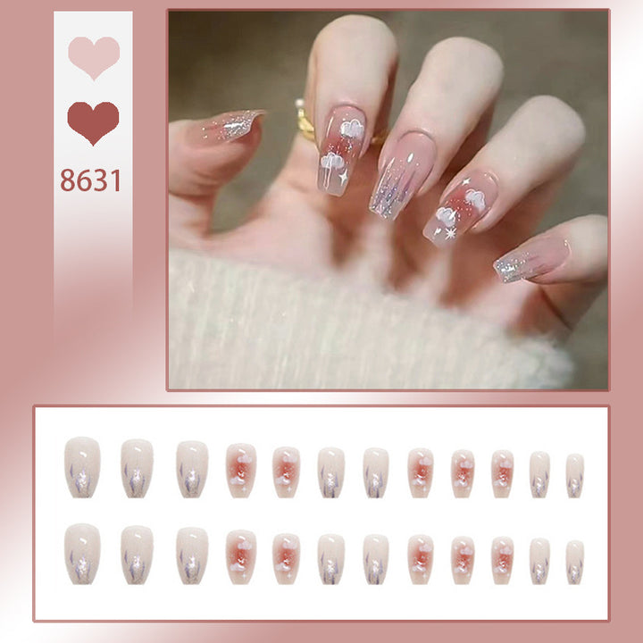 Kunstnagelset mit floralem Design und Glitzerakzenten Karnz