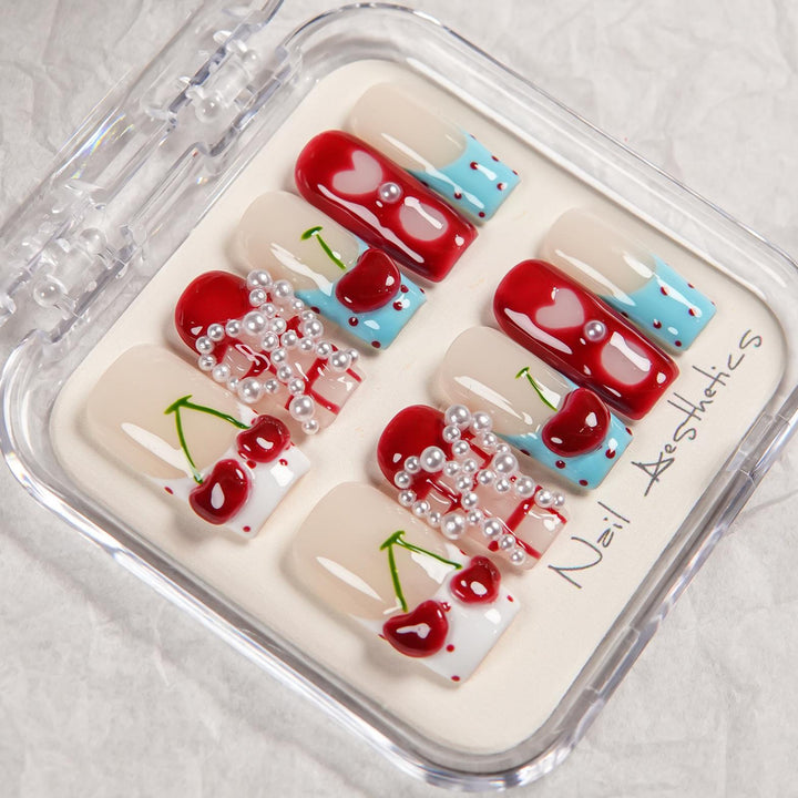 Künstlerisches Press-On-Nagelset mit Kirschdesign