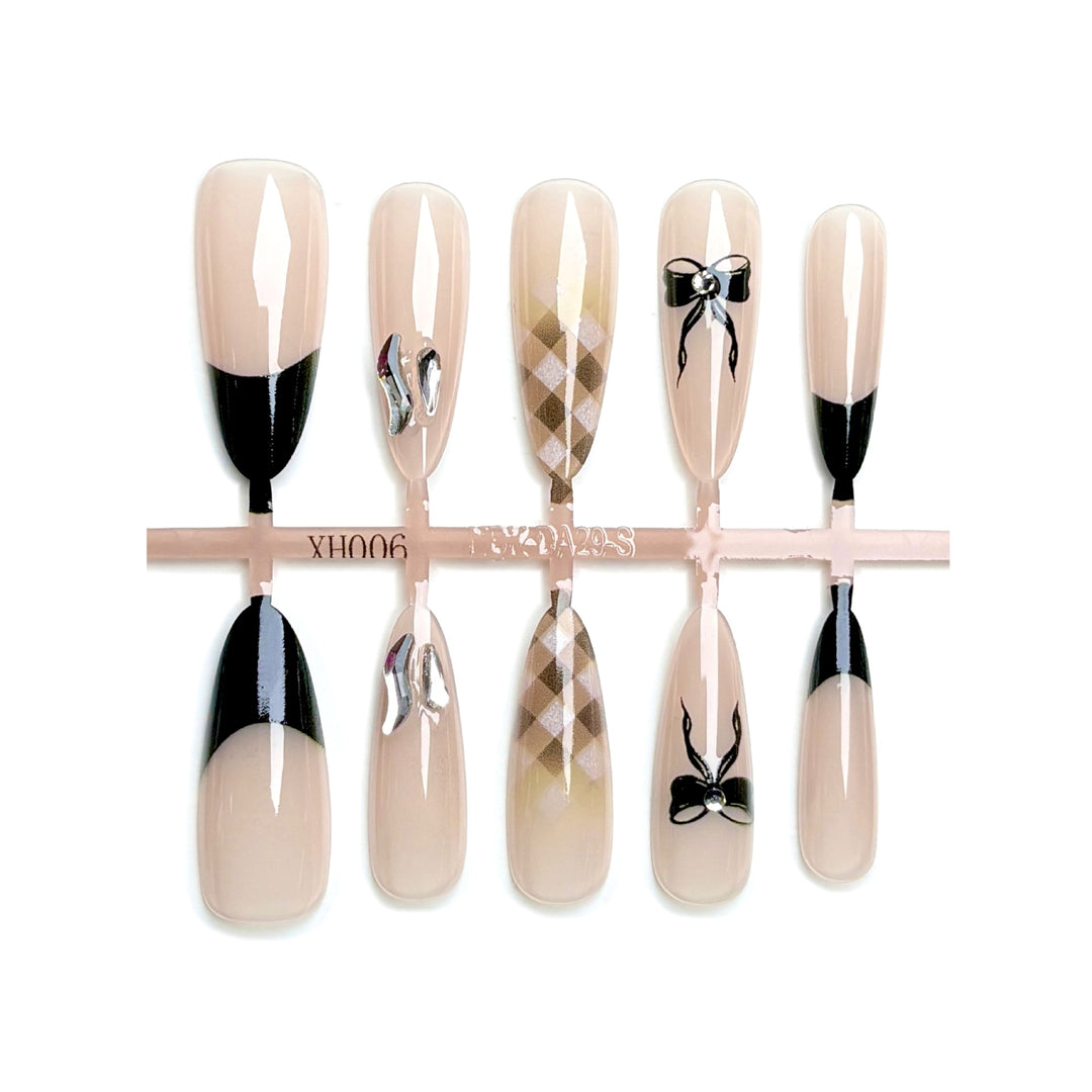 Elegantes Press-On-Nagelkunstset mit stilvollem Bogen und geometrischen Designs