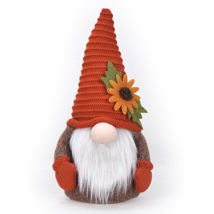 Herbstliche handgefertigte Deko‑Wichtelfigur mit Strickmütze, Filzlaub‑Applikation und Kürbisdetail