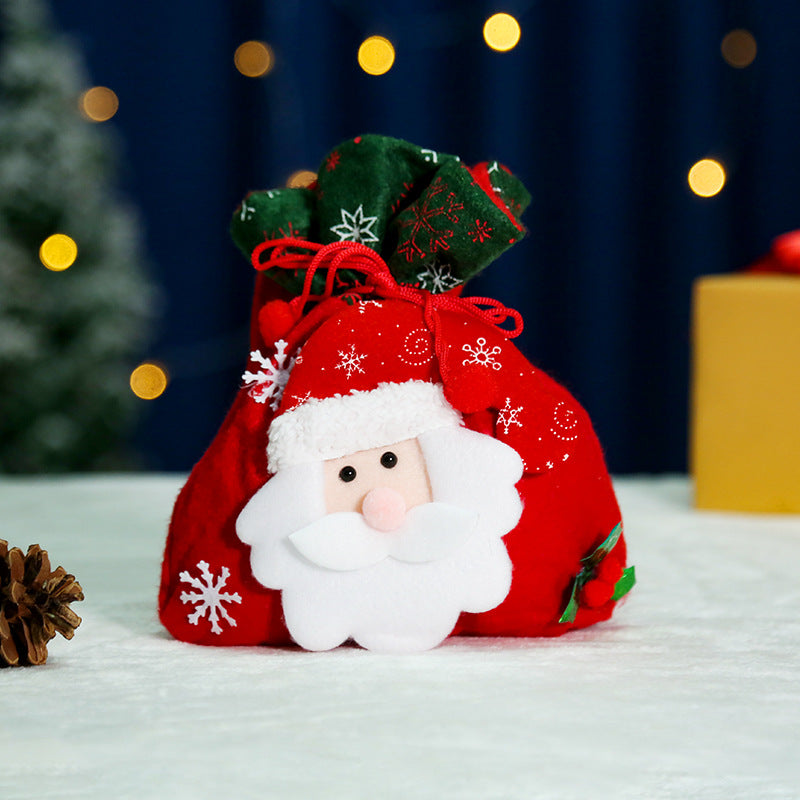 Niedlicher Weihnachtsgnom mit Geschenkesack Karnz