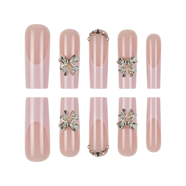 Elegante Stiletto Press-On Nägel mit goldenen Blumendetails Karnz