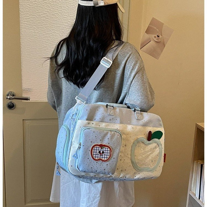 Verspielt gemusterte Reisetasche Karnz