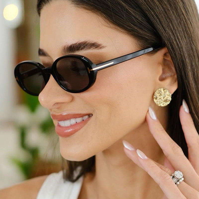 Damen stilvolle ovale Sonnenbrille mit goldenen Details Karnz