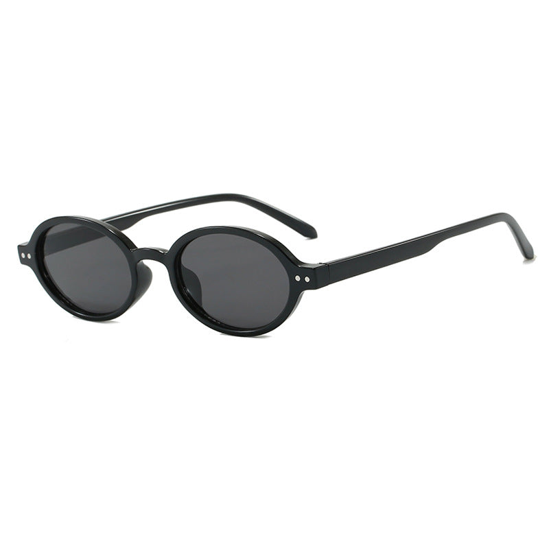 Damen modische ovalförmige Sonnenbrille mit ausgefallenem Rahmen Karnz