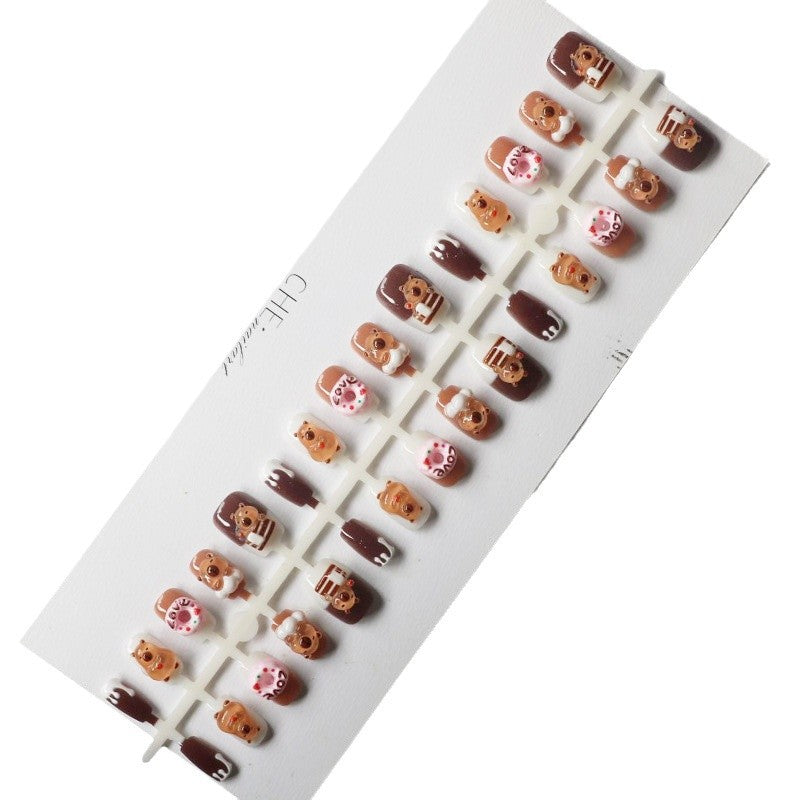 Verspielte Kunstfingernägel mit Tiermotiven Karnz