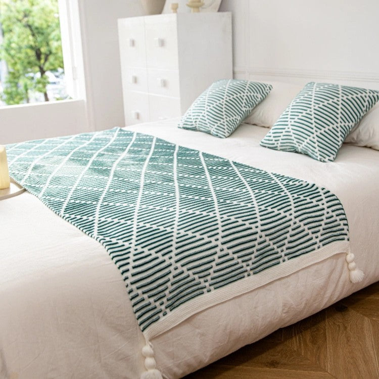 Dekorativer Strickwurfdecke