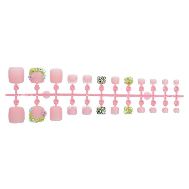 Kreatives Nagelset mit Glitzer- und Blumendesigns Karnz