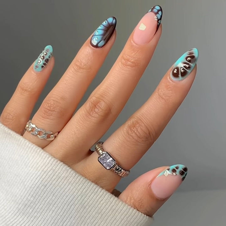 Künstlerische von Schmetterlingen inspirierte Nagelverlängerungen Karnz