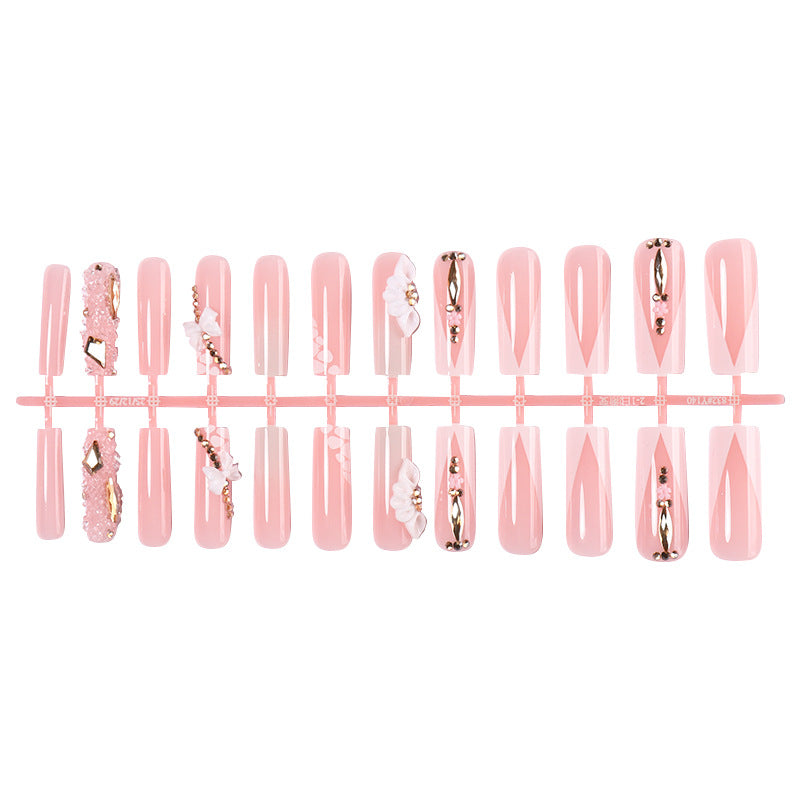 Dekorativer künstlicher Nagelset mit floralen und Juwel-Akzenten Karnz