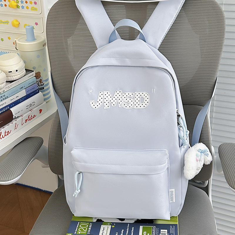 Trendy lässiger Tagesrucksack mit süßem Charakterakzent Karnz
