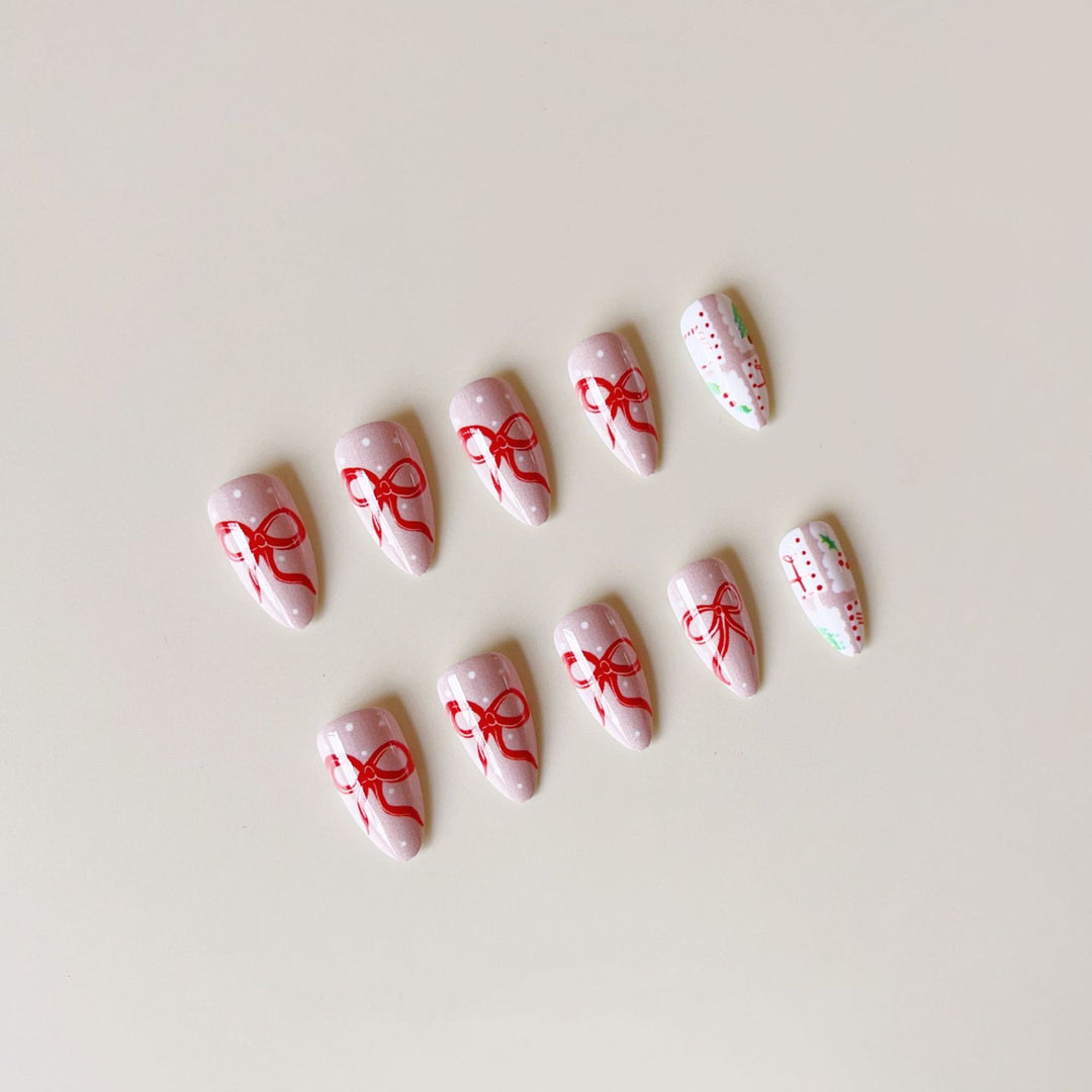 Kunstnagelset mit festlichen Geschenk- und Schleifenmotiven Karnz