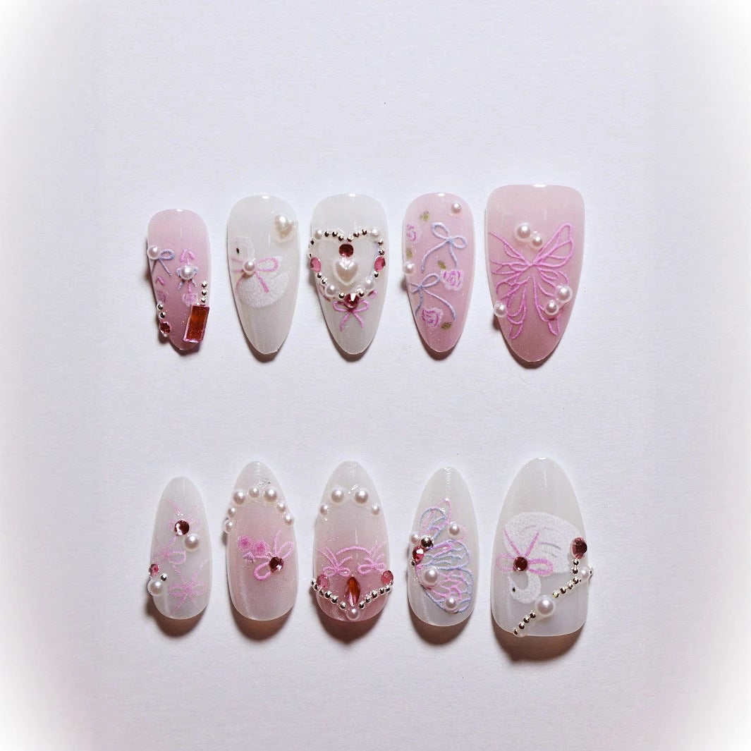Dekorative 3D Schleife und Perle Press-On Nagelkunst Karnz