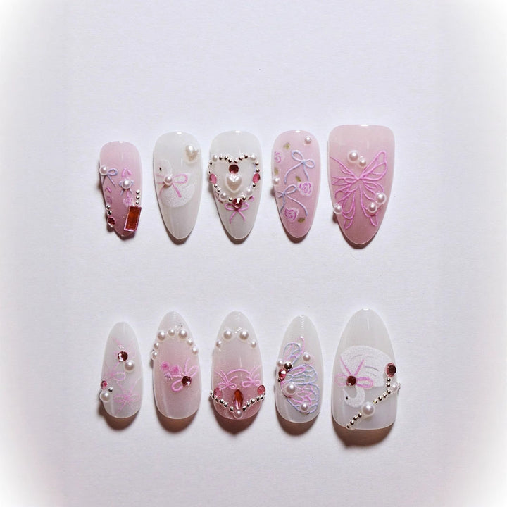 Dekorative 3D Schleife und Perle Press-On Nagelkunst Karnz