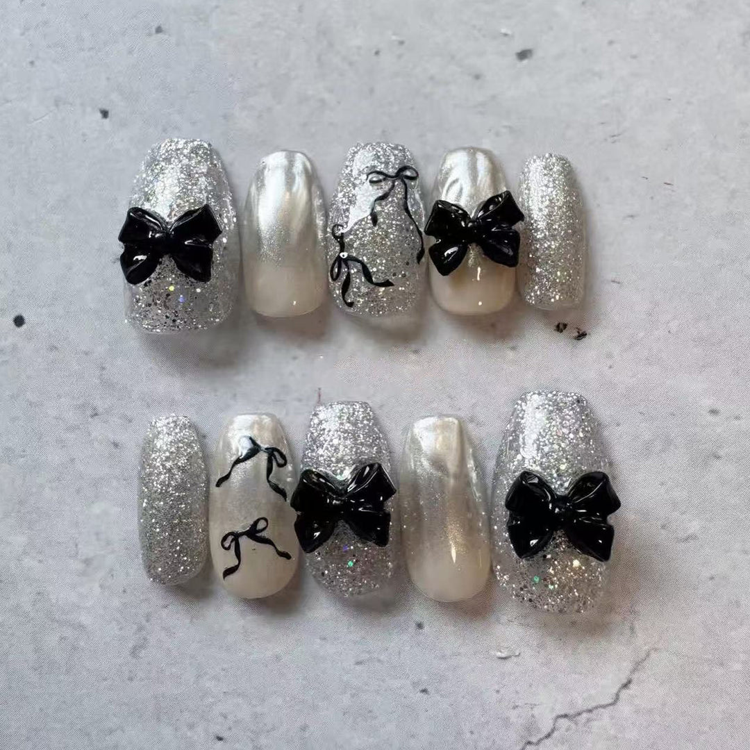 Glitzerndes Schleifen-Akzent Press-On Nagelset Karnz