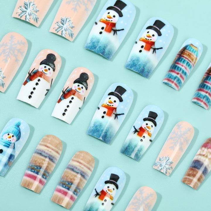Festliche Kunstnägel mit Schneemann-Motiv Karnz