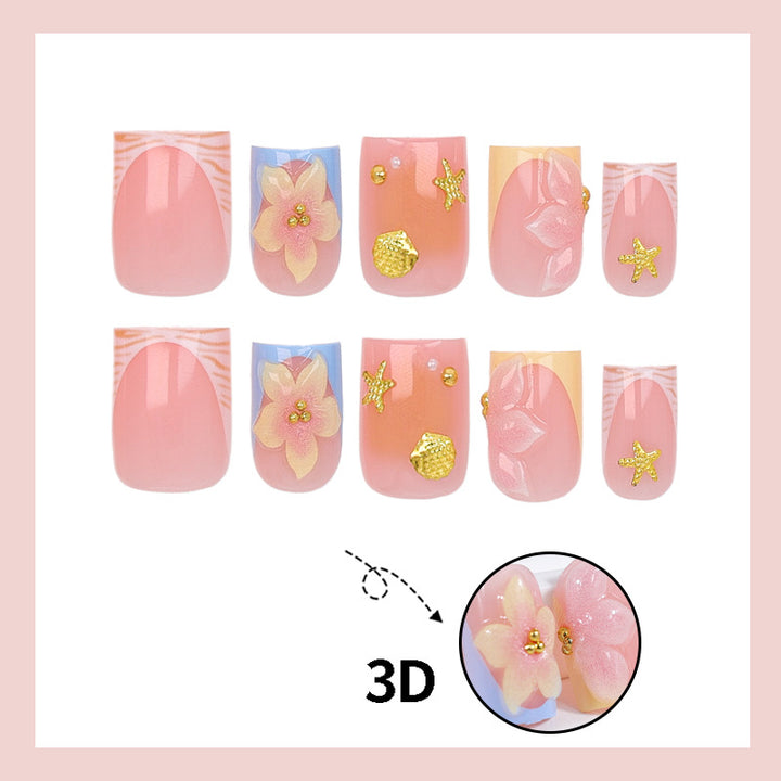 Kunstnagelset mit floralen Akzenten und elegantem Glanz Karnz