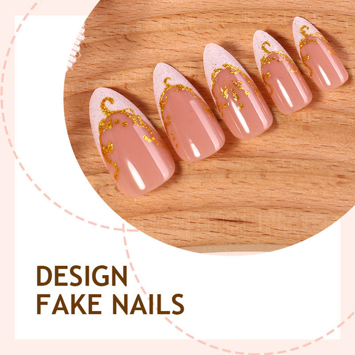 Kunstnagelset mit edlen Goldakzenten und transparentem Design Karnz