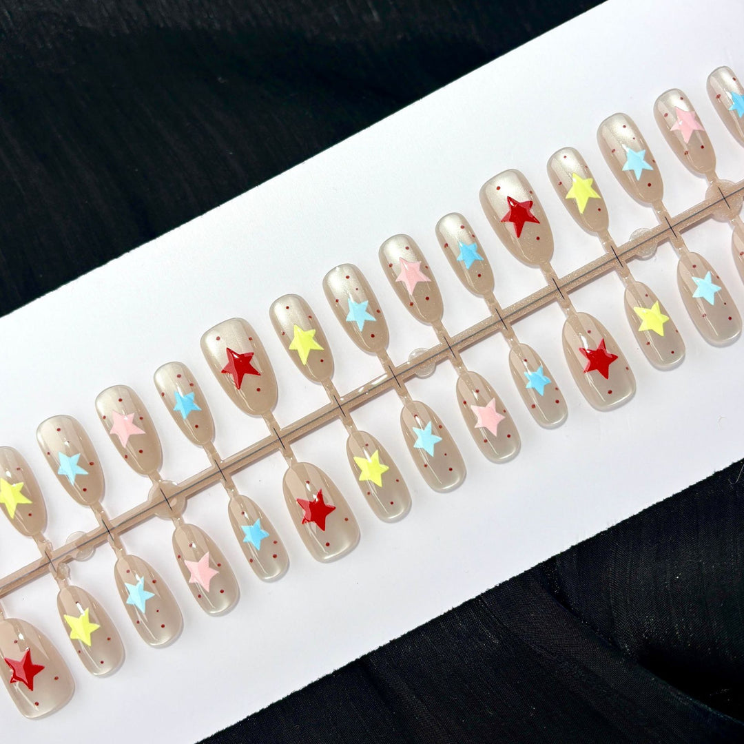 Künstlerisches Sterne-Design Press-On Nagelset