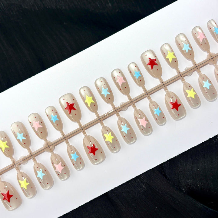 Künstlerisches Sterne-Design Press-On Nagelset