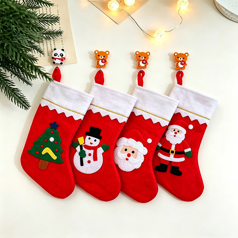 Niedlicher Weihnachtsstrumpf mit festlichen Motiven Karnz