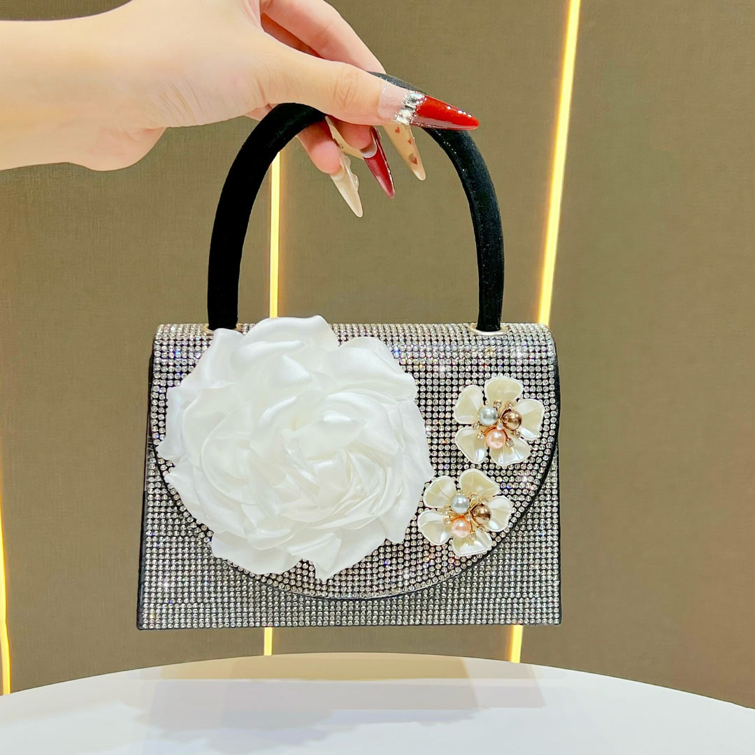 Blumengeschmückte Handtasche für den Abend