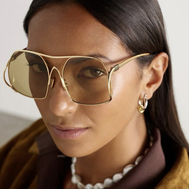 Damen geometrische Sonnenbrille mit schmalem Metallrahmen und braunen Gläsern Karnz