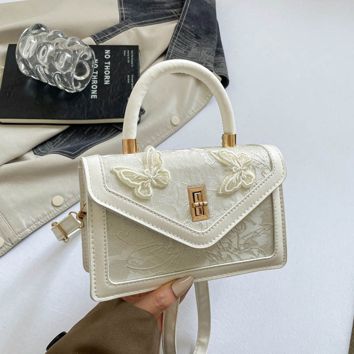 Elegante bestickte Handtasche